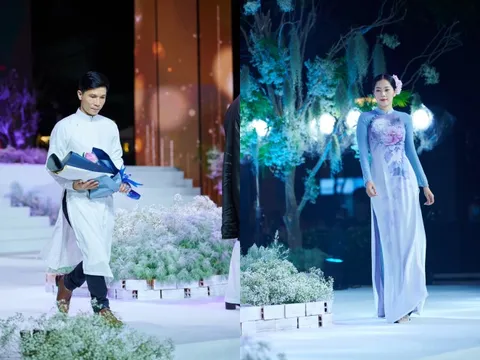 Nam Em trình diễn áo dài của NTK Trung Đinh